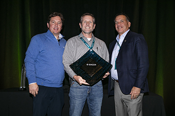 Company leadership with the award  